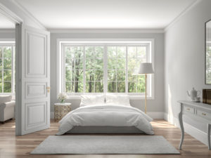 White room featuring large window with lots of natural light